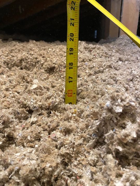 Tape measure showing the new R50 cellulose depth