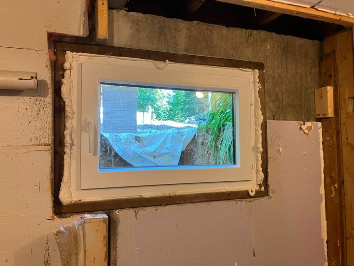 New egress window in the framed opening, inside