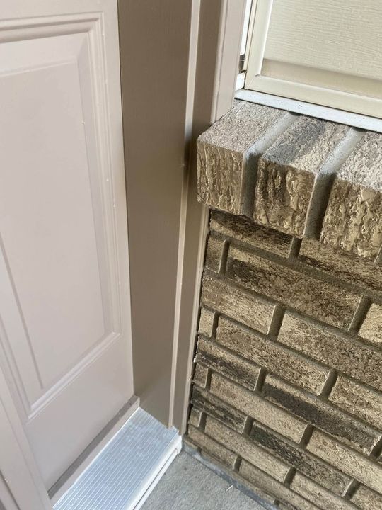 Tight brick return beside the old door jamb