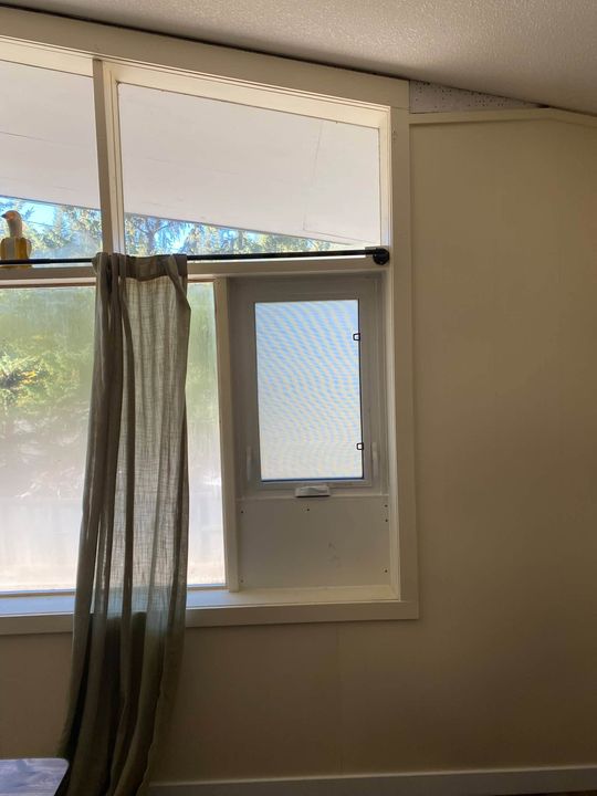 New casement window seen from inside the rental unit